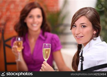Woman toasting in restaurant
