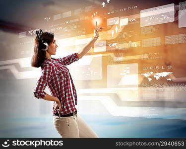 Woman touching virtual screen