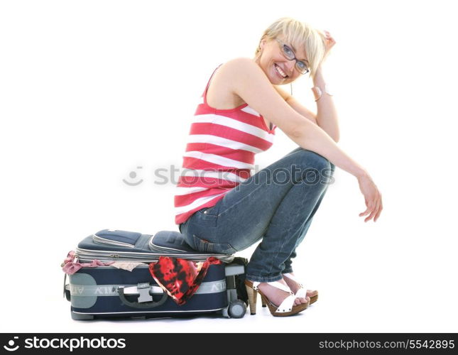 woman tourist packing travel bag isolated on white backgound in studio