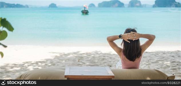 Woman tourist rest on Beautiful beach Island at summer. destination, wanderlust, Asia Travel, tropical summer, vacation and holiday concept