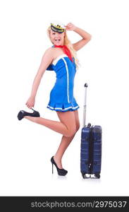 Woman travel attendant with suitcase on white