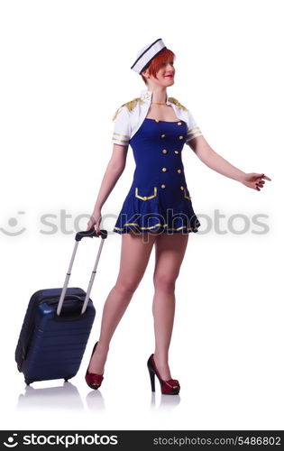 Woman travel attendant with suitcase on white