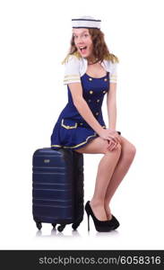 Woman travel attendant with suitcase on white