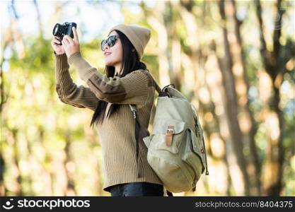 woman traveler going alone in the forest
