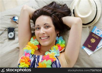 woman traveler laying on bed