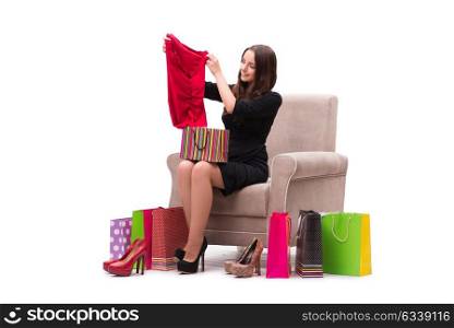 Woman trying new clothing sitting on sofa