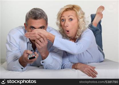 Woman trying to block her husband&rsquo;s view