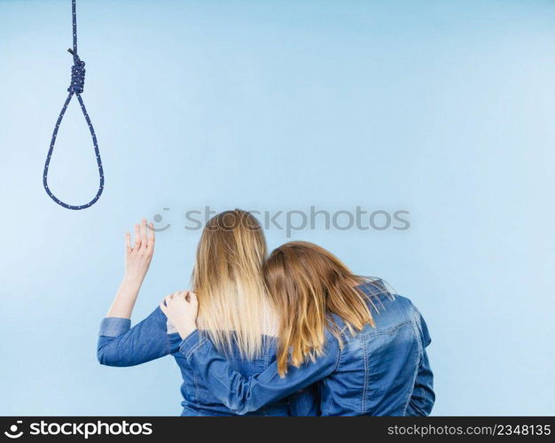 Woman trying to help her best friend with suicidal thoughts. Friendship and depression concept.. Woman helping her friend with suicidal thoughts