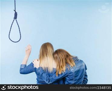 Woman trying to help her best friend with suicidal thoughts. Friendship and depression concept.. Woman helping her friend with suicidal thoughts