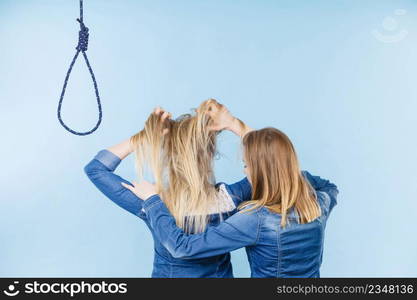 Woman trying to help her best friend with suicidal thoughts. Friendship and depression concept.. Woman helping her friend with suicidal thoughts