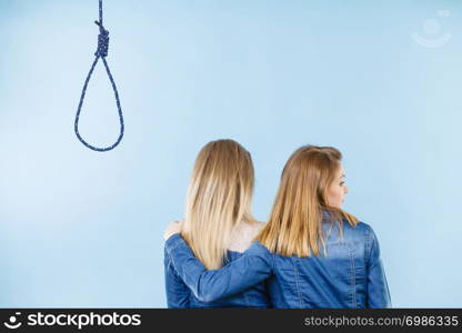 Woman trying to help her best friend with suicidal thoughts. Friendship and depression concept.. Woman helping her friend with suicidal thoughts