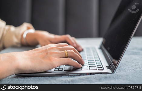 Woman typing work or chatting on laptop Suitable for making infographics.