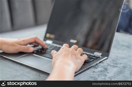 Woman typing work or chatting on laptop Suitable for making infographics.