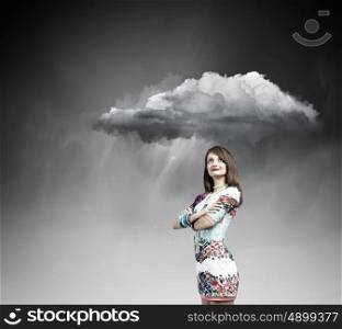 Woman under rain. Young pretty woman standing under raining cloud
