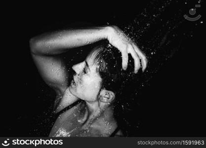 Woman under the Shower.. Beautiful Woman Taking a Shower