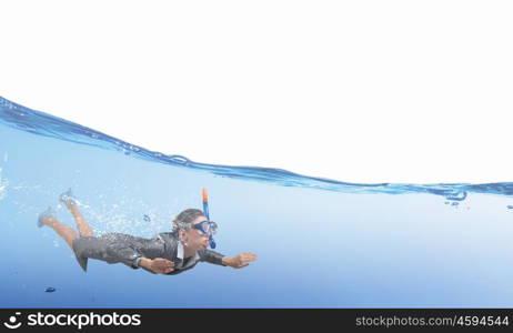 Woman under water. Businesswoman in suit and mask swimming under water