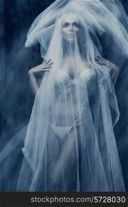 woman under white veil