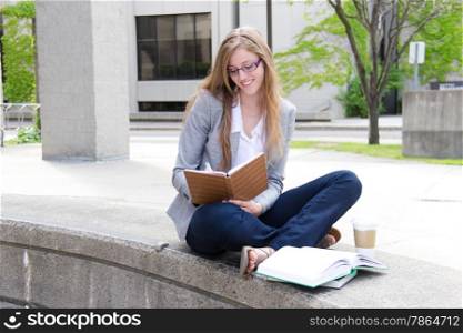 Woman university student studying on campus