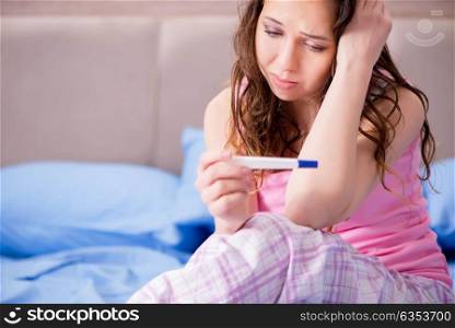 Woman upset with pregnancy test results