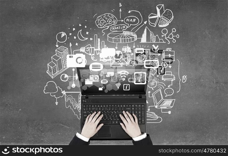 Woman use laptop. Top view of businesswoman hands using black laptop