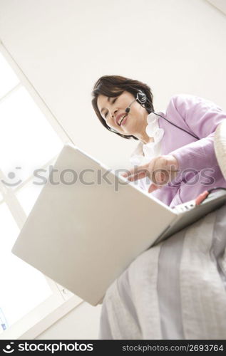 Woman using a laptop