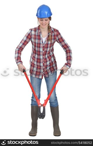 Woman using bolt-cutters