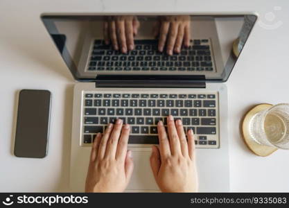 woman using computer laptop for work online at living room