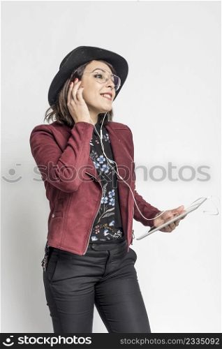 Woman using digital tablet computer happy isolated on white background. Portrait young hispanic woman worker, teacher, mentoring in shirt office style with tablet in hand