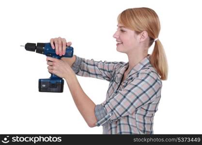 Woman using drill