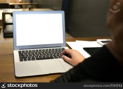 Woman using empty blank screen laptop.