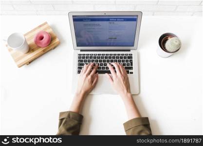 woman using facebook social site laptop. Resolution and high quality beautiful photo. woman using facebook social site laptop. High quality and resolution beautiful photo concept