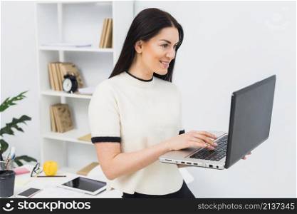 woman using laptop office