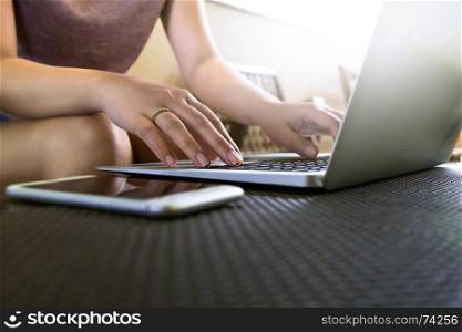 woman using laptop, searching web, browsing information