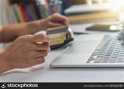 woman using laptop shopping purchasing online, paying by credit card, making payment, checking balance, browsing internet banking service.