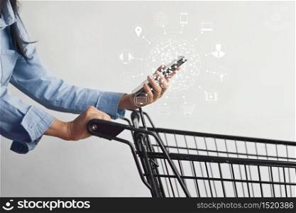 woman using mobile payments online shopping and icon customer network connection on screen, m-banking and omni channel