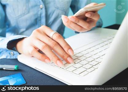 Woman using mobile phone and laptop computer, Technology, gadget. Woman using mobile phone and laptop computer, Technology, gadget lifestyle concept