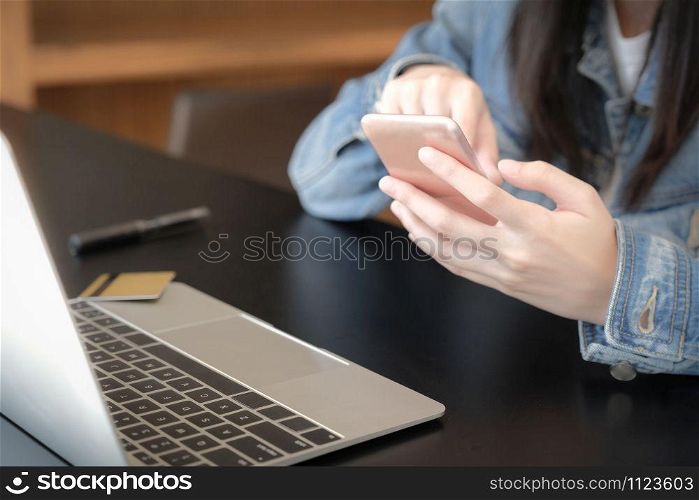 woman using mobile smart phone for shopping online