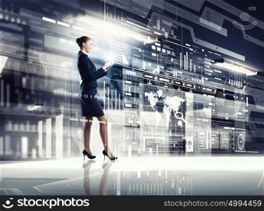 Woman using modern technologies. Businesswoman with mobile phone against high tech background