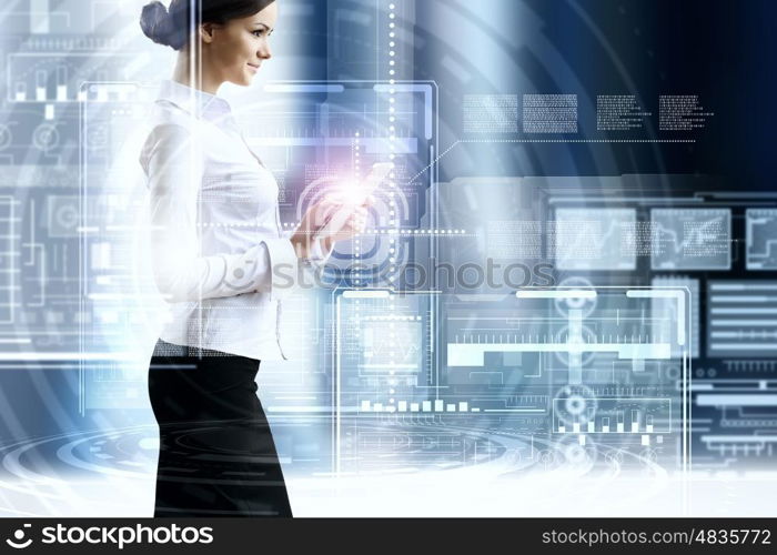 Woman using modern technologies. Businesswoman with tablet pc against high tech background