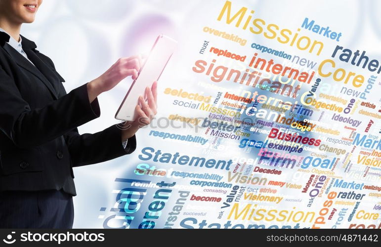 Woman using modern technologies. Businesswoman with tablet pc against high tech background