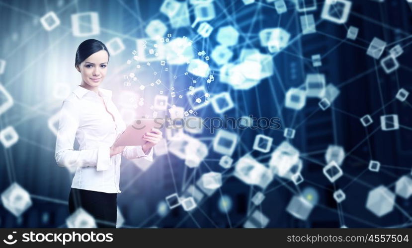 Woman using modern technologies. Businesswoman with tablet pc against high tech blue background