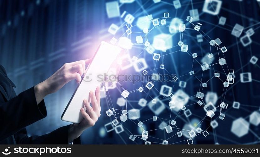 Woman using modern technologies. Hands of businesswoman with tablet pc against high tech background