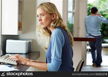 Woman Using PC at Home