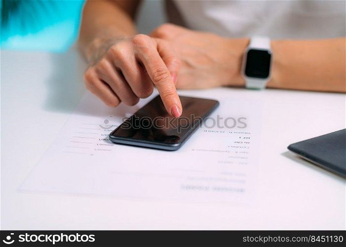 Woman Using Smart Phone Application for Blood Panel List . Woman Using Smart Phone Application for Blood Panel List