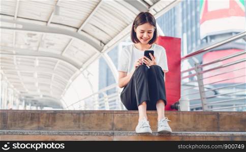 Woman using smartphone, During leisure time. The concept of using the phone is essential in everyday life.