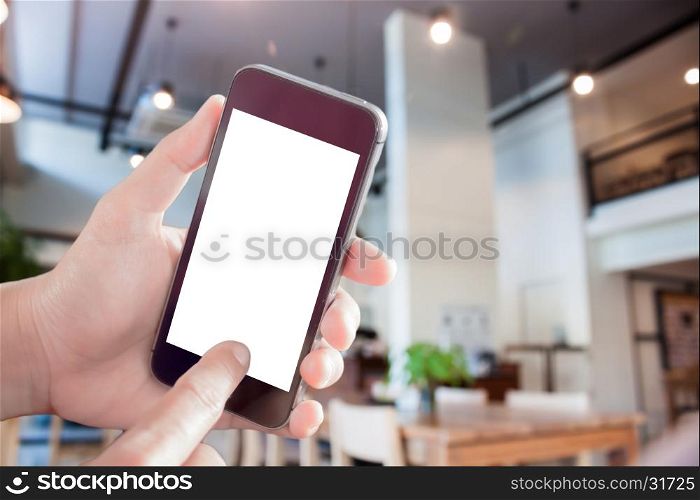 Woman using smartphone with abstract blur coffee shop, stock photo