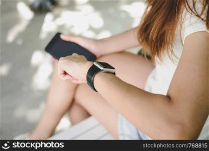 Woman using smartwatch with e-mail notifier. smartwatch hand device notify computer internet message e-mail concept. Woman hand with smartwatch. Technology concepts
