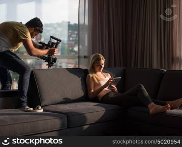 woman using technology on sofa in modern apartment