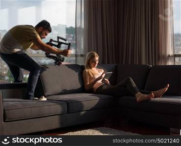 woman using technology on sofa in modern apartment