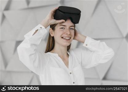 woman using virtual reality headset indoors